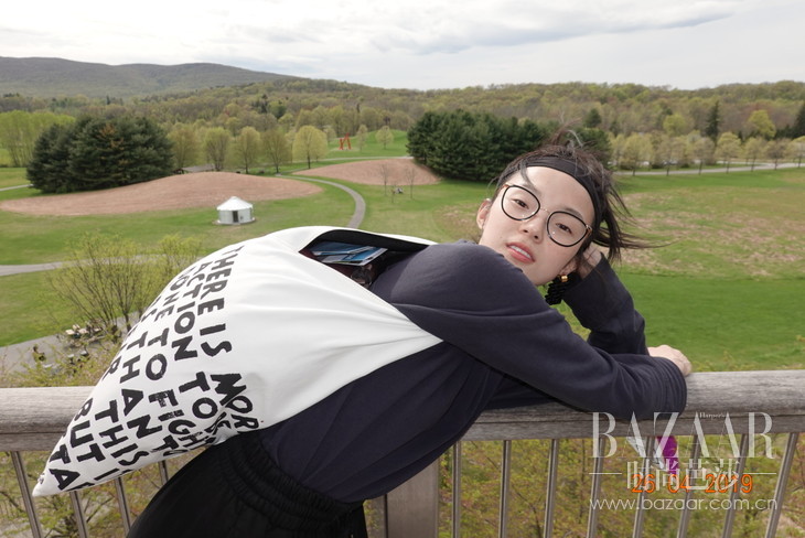 Ju Xiaowen Wearing MM6 AIDS PRINT BAG