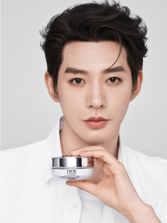 skincare product advertisement featuring a person holding a jar